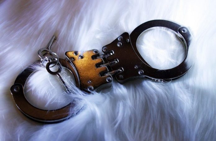 bitsonline-handcuffs-carnival-e1549737162740.jpg