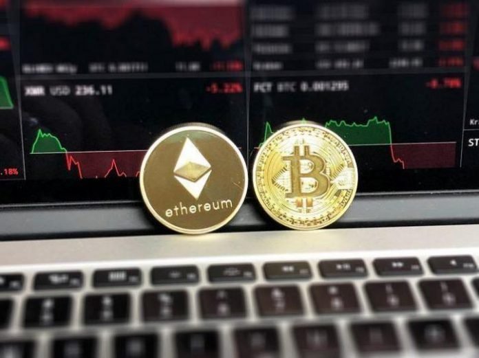 bitcoin-blockchain-business-730569 ethereum and bitcoin coins sitting on a computer